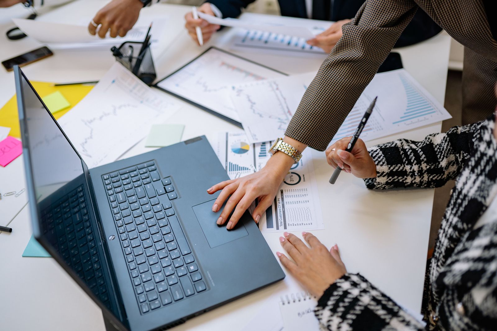 Business team reviewing information during a consultation